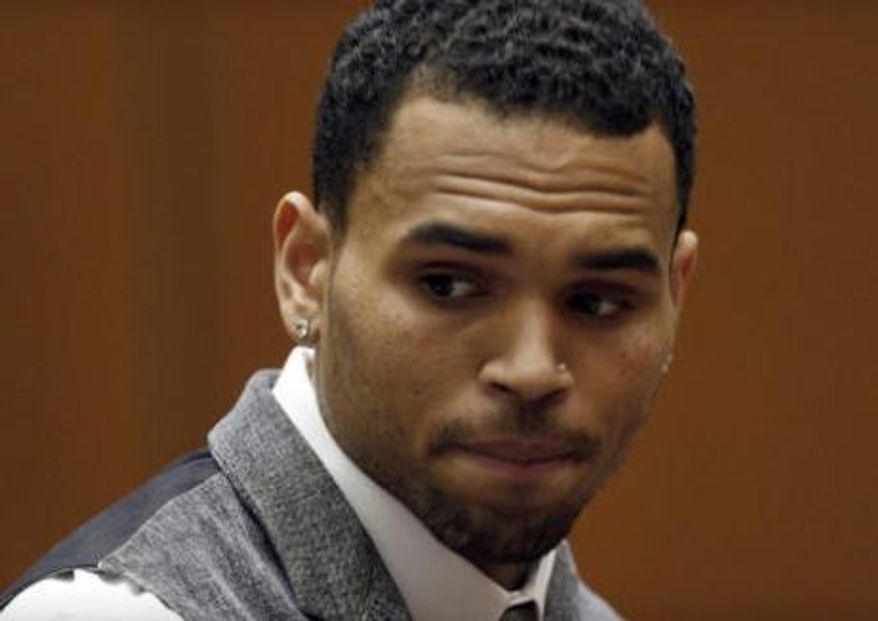 Chris Brown sitting in a Los Angeles courtroom, Sept. 25, 2012. (Associated Press)