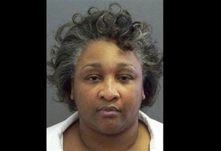 ** FILE ** This undated file photo provided by the Texas Department of Criminal Justice shows Kimberly McCarthy, who is on death row in Texas for the 1997 killing of a neighbor during a robbery. McCarthy is scheduled to be executed on June 26 and would be the 500th in Texas since the death penalty was reinstated by the Supreme Court in 1976. (Associated Press)