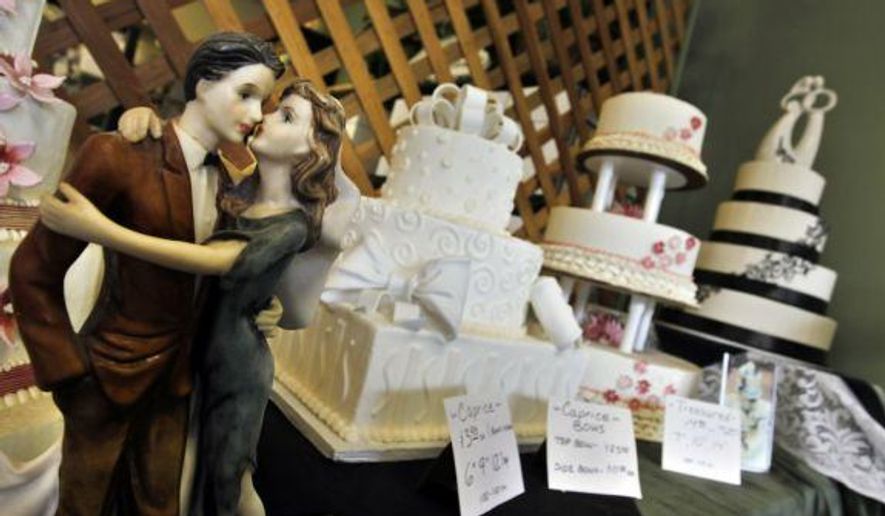 ** FILE ** A wedding cake made by chefs at Masterpiece Cakeshop in Denver, Colo. (Associated Press)
