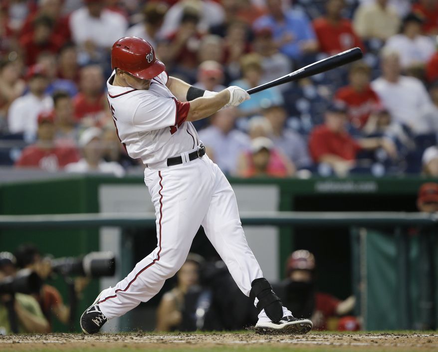 Tyler Moore homers in the Nationals' 3-2 victory over the Diamondbacks on Wednesday night. Moore's homer tied the game. (Associated Press photo)