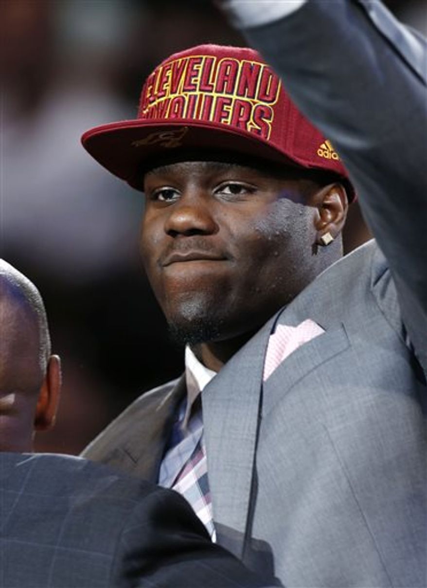 UNLV's Anthony Bennett waves after being selected first overall by the Cleveland Cavaliers in the NBA basketball draft, Thursday, June 27, 2013, in New York. (AP Photo/Jason DeCrow)