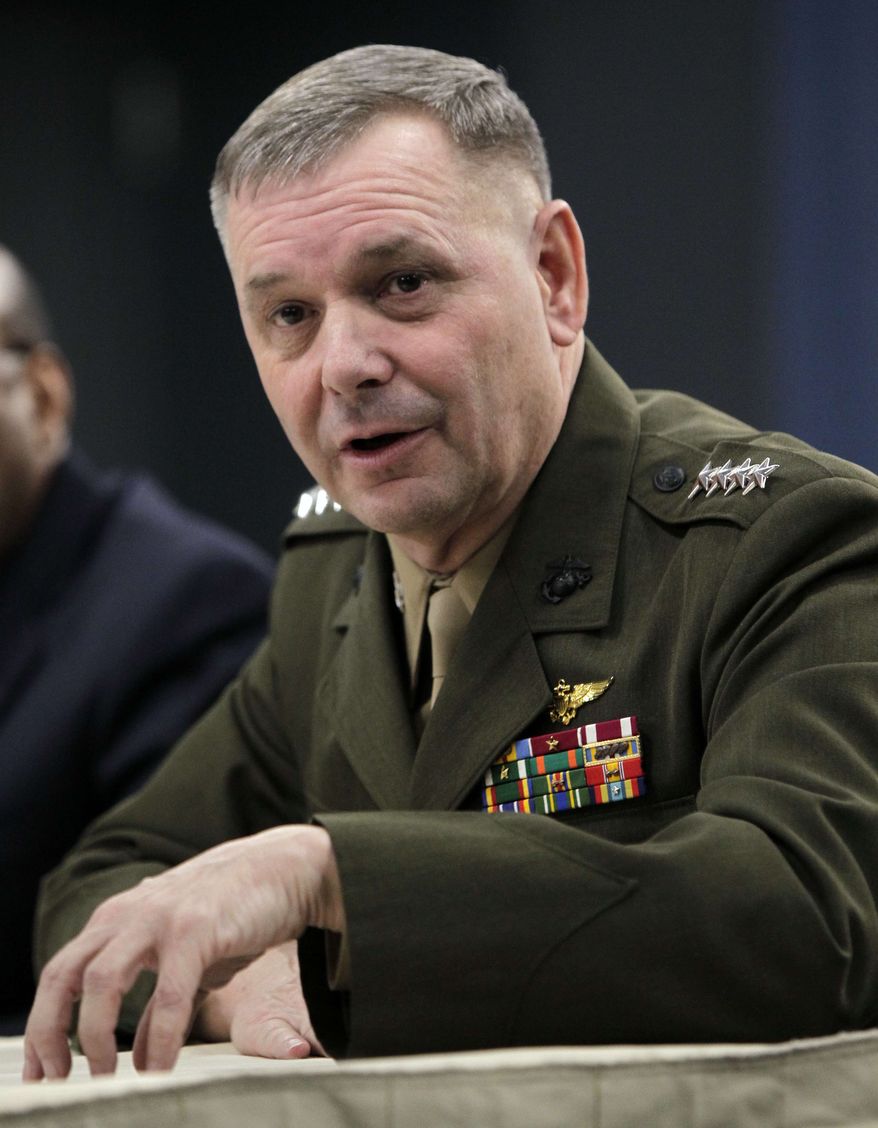 ** FILE ** In this Jan. 29, 2011, file photo, then Joint Chiefs Vice Chairman Gen. James E. Cartwright takes part in media briefing at the Pentagon in Washington. The retired Marine general is under investigation for allegedly leaking classified information about a covert cyberattack on Iran's nuclear facilities, according to media reports Thursday, June 27, 2013. (AP Photo/Pablo Martinez Monsivais)