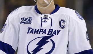 **FILE** Tampa Bay Lightning&#39;s Vincent Lecavalier on the ice during the first period of an NHL hockey game against the Boston Bruins in Boston, Saturday, March, 2, 2013. (AP Photo/Michael Dwyer)