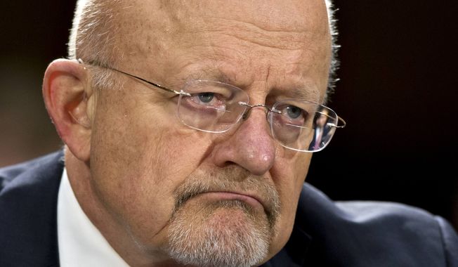 ** FILE ** National Intelligence Director James Clapper testifying on Capitol Hill in Washington, April 18, 2013. Clapper is apologizing for telling Congress earlier this year that the National Security Agency does not collect data on millions of Americans. (AP Photo/J. Scott Applewhite, File)