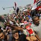 Opponents of Egypt&#x27;s Islamist President Mohammed Morsi shout slogans during a protest in Tahrir Square in Cairo, Egypt, Wednesday, July 3, 2013. (AP Photo/Amr Nabil)