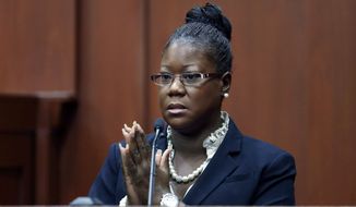 Sybrina Fulton, the mother of Trayvon Martin, takes the stand during George Zimmerman&#39;s trial in Seminole County circuit court in Sanford, Fla., on July 5, 2013. Zimmerman has been charged with second-degree murder for the 2012 shooting death of Martin. (Associated Press/Orlando Sentinel)