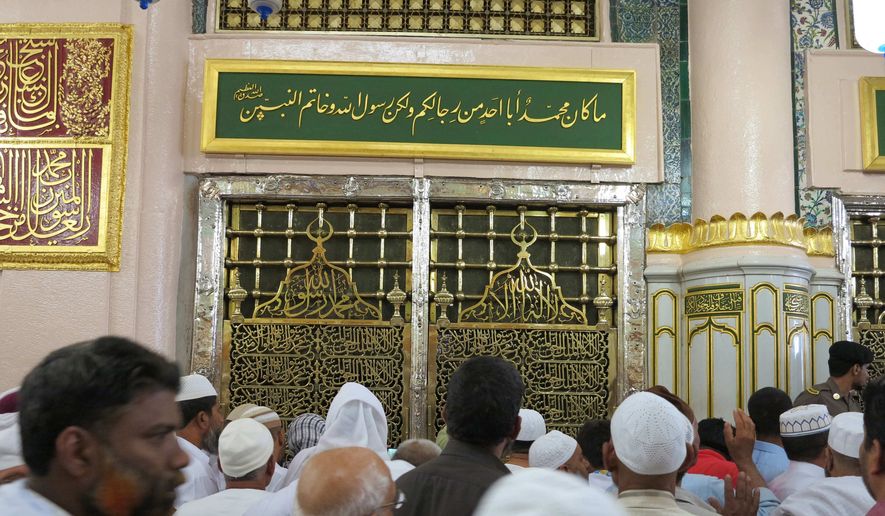 Worshippers visit the Prophet Mohammad&#39;s tomb inside the Prophet Mohammad&#39;s Mosque in Medinah city in Saudi Arabia, Saturday, July 6, 2013. (AP Photo/Hadi Mizban) ** FILE **