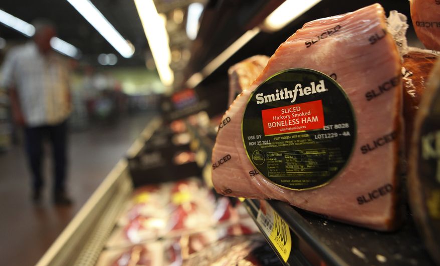 **FILE** A Smithfield ham is seen Sept. 6, 2011, at a grocery store in Richardson, Texas. (Associated Press)