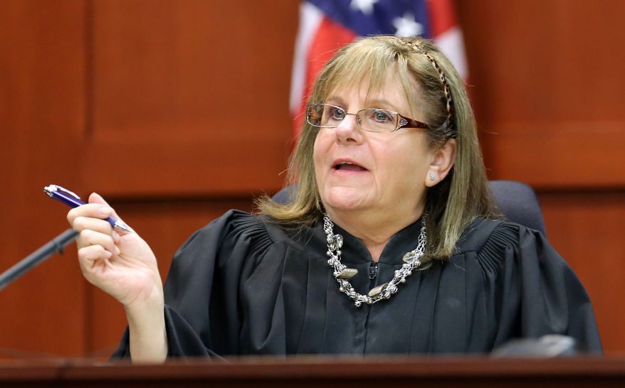 Judge Debra Nelson asks attorneys to project an animation image while listening to testimony from forensics animation expert Daniel Shoemaker during George Zimmerman's trial in Seminole Circuit Court in Sanford, Fla., on Tuesday, July 9, 2013. Mr. Zimmerman is charged with second-degree murder in the fatal shooting of Trayvon Martin, an unarmed teen, in 2012. (AP Photo/Orlando Sentinel, Joe Burbank, Pool)