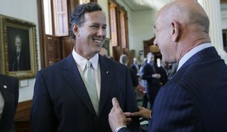 Former Pennsylvania Sen. Rick Santorum (left) talks with Texas state Sen. John Whitmire, Houston Democrat, in the Senate Chambers in Austin on July 11, 2013. A Senate committee pushed through new abortion restrictions, setting up a Senate vote before the weekend to send it to Gov. Rick Perry. The bill would require doctors to have admitting privileges at nearby hospitals, only allow abortions in surgical centers, dictate when abortion pills are taken and ban abortions after 20 weeks. (Associated Press)