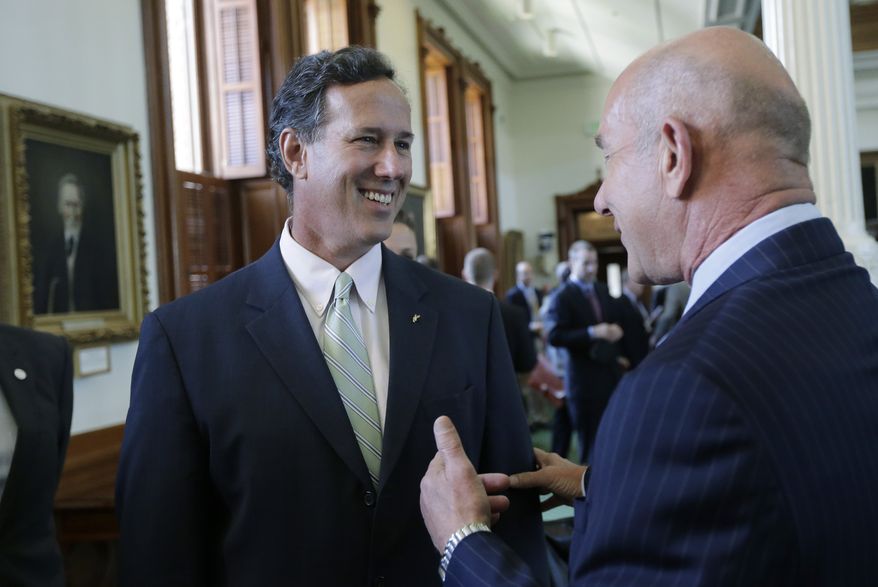 Former Pennsylvania Sen. Rick Santorum (left) talks with Texas state Sen. John Whitmire, Houston Democrat, in the Senate Chambers in Austin on July 11, 2013. A Senate committee pushed through new abortion restrictions, setting up a Senate vote before the weekend to send it to Gov. Rick Perry. The bill would require doctors to have admitting privileges at nearby hospitals, only allow abortions in surgical centers, dictate when abortion pills are taken and ban abortions after 20 weeks. (Associated Press)
