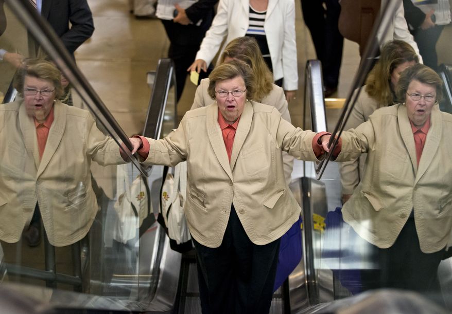 Senate Appropriations Committee Chair Sen. Barbara Mikulski, D-Md., rides an escalator in Washington, Wednesday, July 10, 2013, as senators rushed to the floor for a vote to end debate on the Democrats&#x27; plan to restore lower interest rates on student loans one week after Congress&#x27; inaction caused those rates to double. (AP Photo/J. Scott Applewhite)
