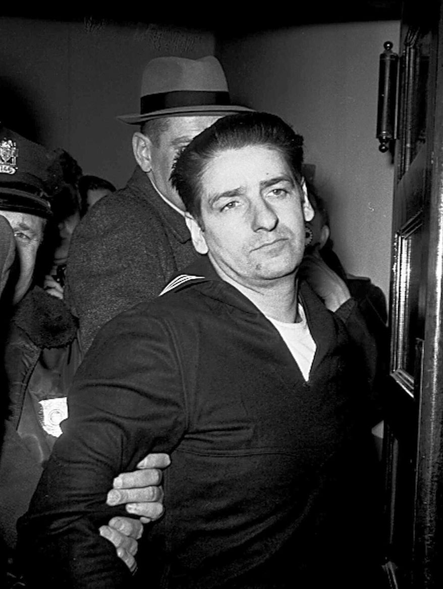 ** FILE ** This Feb. 25, 1967, file photo shows self-confessed Boston Strangler Albert DeSalvo minutes after his capture in Boston. (AP Photo, File)