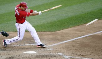 Washington Nationals&#39; Ryan Zimmerman breaks his bat on an RBI single against the San Diego Padres during the seventh inning of the Nationals&#39; 5-4 win on July 6, 2013. (Associated Press)