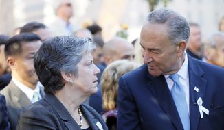 **FILE** Homeland Security Secretary Janet Napolitano speaks with New York Sen. Charles Schumer during observances marking the 11th anniversary of the terror attacks on the World Trade Center on Sept. 11, 2012 in New York. (Associated Press)