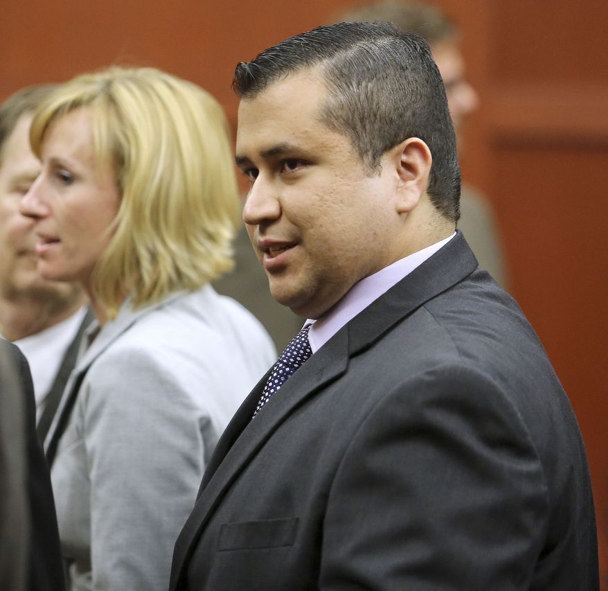 George Zimmerman leaves Seminole Circuit Court with his family on Saturday, July 13, 2013, in Sanford, Fla., after a jury found him not guilty of second-degree murder in the fatal shooting of 17-year-old Trayvon Martin. (AP Photo/Joe Burbank, Pool)