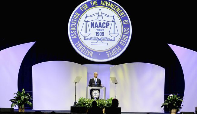 Attorney General Eric H. Holder Jr. delivers a speech Tuesday at the NAACP&#x27;s annual convention in Orlando, Fla., during which he addressed the George Zimmerman trial. (Associated Press)