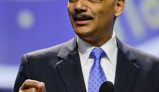 Attorney General Eric H. Holder Jr. delivers a speech Tuesday at the NAACP’s annual convention in Orlando, Fla., during which he addressed the George Zimmerman trial. (Associated Press)