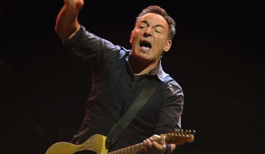 Bruce Springsteen dedicated his protest song "American Skin (41 Shots)" to the late teen Trayvon Martin at a concert in Limerick, Ireland on Tuesday. The singer-songwriter is shown here performing with the E Street Band at a concert in Stockholm. (AP Photo/Henrik Montgomery)   SWEDEN OUT
