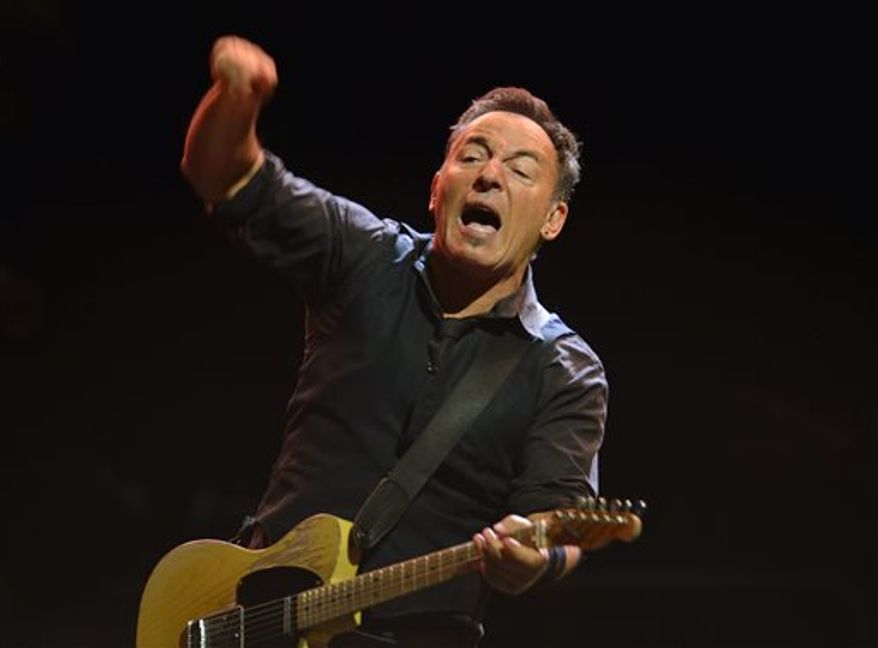Bruce Springsteen dedicated his protest song "American Skin (41 Shots)" to the late teen Trayvon Martin at a concert in Limerick, Ireland on Tuesday. The singer-songwriter is shown here performing with the E Street Band at a concert in Stockholm. (AP Photo/Henrik Montgomery)   SWEDEN OUT