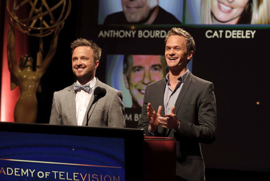 Actors Aaron Paul, left, and Neil Patrick Harris announce nominations at the 65th Primetime Emmy Nominations Announcements at the Leonard H. Goldenson Theatre at the Academy of Television Arts & Sciences, Thursday, July 18, 2013, in North Hollywood, Calif. (Photo by Todd Williamson/Invision/AP)