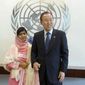 United Nations Secretary-General Ban Ki-moon, right, holds Malala Yousafzai&#39;s hand while posing for photographers, Friday, July 12, 2013, at United Nations headquarters. Malala Yousafzai, the Pakistani teenager shot by the Taliban for promoting education for girls, celebrated her 16th birthday on Friday addressing the United Nations. (AP Photo/Mary Altaffer)