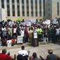 Radio talk show host Joe Madison addresses a &quot;Justice for Trayvon&quot; rally outside the U.S. District Court for the District on Saturday (Andrea Noble/The Washington Times)