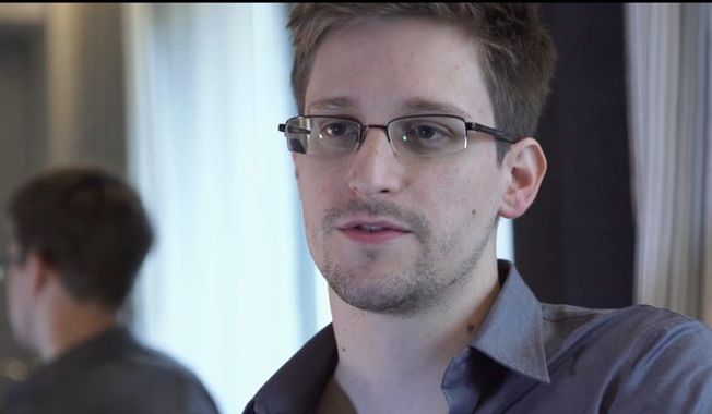The father of National Security Agency leaker Edward J. Snowden arrived Thursday, Oct. 11 in Moscow hoping to meet his son. “I am his father. I love my son,” Lon Snowden told reporters in remarks broadcast by Russian TV. (Associated Press)
