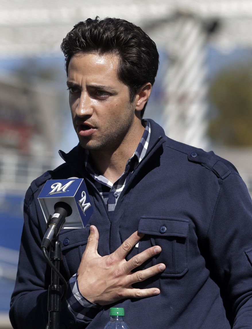 FILE - In this Feb. 24, 2012 file photo, Milwaukee Brewers' Ryan Braun speaks during a news conference at spring training baseball in Phoenix. Braun stood on a spring training field and proclaimed he was innocent of using banned testosterone. "I would bet my life," he said back then, "that this substance never entered my body at any point." Seventeen months later, he accepted a 65-game suspension from baseball and admitted, "I am not perfect. The 2011 National League MVP was suspended without pay for the rest of the season and the postseason Monday, July 22, 2013, the start of sanctions involving players reportedly tied to a Florida clinic accused of distributing performance-enhancing drugs. (AP Photo/Jae C. Hong, File)