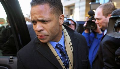 FILE - in this Feb. 20, 2013 file photo, former Illinois Rep. Jesse Jackson, Jr  leaves federal court in Washington after he entered a guilty plea to criminal charges that he engaged in a scheme to spend $750,000 in campaign funds on personal items. On Friday, June 7, 2013, prosecutors recommended Jackson be given four years in prison. He is scheduled to be sentenced July 3. The government is also recommending that Jackson pay $750,000 in restitution to the campaign and forfeit an additional $750,000.  (AP Photo/Cliff Owen, File)