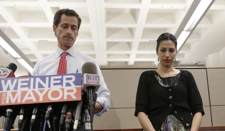 Then-New York mayoral candidate Anthony Weiner speaks during a news conference alongside his wife, Huma Abedin, at the Gay Men&#39;s Health Crisis headquarters in New York on July 23, 2013. (Associated Press) **FILE**
