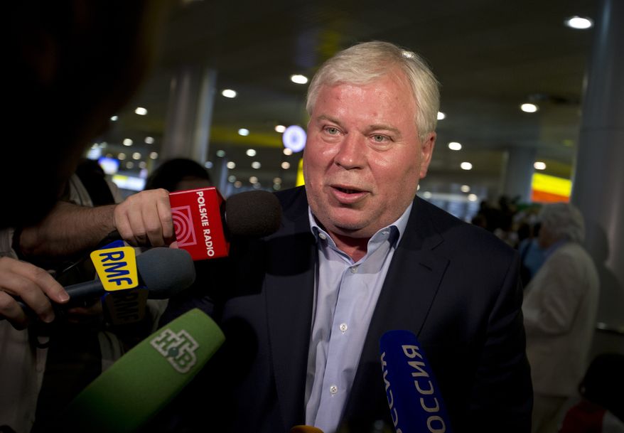 ** FILE ** Russian lawyer Anatoly Kucherena speaks to the media at Sheremetyevo Airport outside Moscow on Friday, July 12, 2013. (AP Photo/Alexander Zemlianichenko)