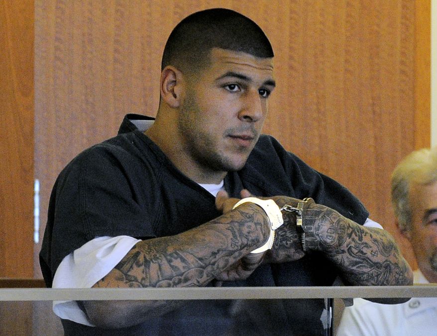 FILE - In this June 27, 2013, file photo, former New England Patriots NFL football tight end Aaron Hernandez stands during a bail hearing in Fall River Superior Court in Fall River, Mass. The legal problems of current and former SEC players _ from ex-Florida and NFL tight end Aaron Hernandez to LSU’s Jeremy Hill _ has cast a negative light on the league that has won seven consecutive national championships. Coaches in the conference say they have to weigh a player’s talent vs. trouble in or out of the locker room. (AP Photo/Boston Herald, Ted Fitzgerald, Pool, File)