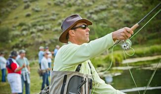 Fly-fishing is just one of the activities shared by businessmen, regulators, bankers and political leaders during the annual Rocky Mountain Economic Summits organized by brothers Justin and Cody Hyde at their Wyoming ranch. (Russ Dixon)