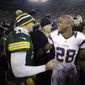 Minnesota Vikings running back Adrian Peterson (28) is the top-rated fantasy player heading into 2013, but Green Bay Packers quarterback Aaron Rodgers (12) is worth a high pick. (AP Photo/Jeffrey Phelps)