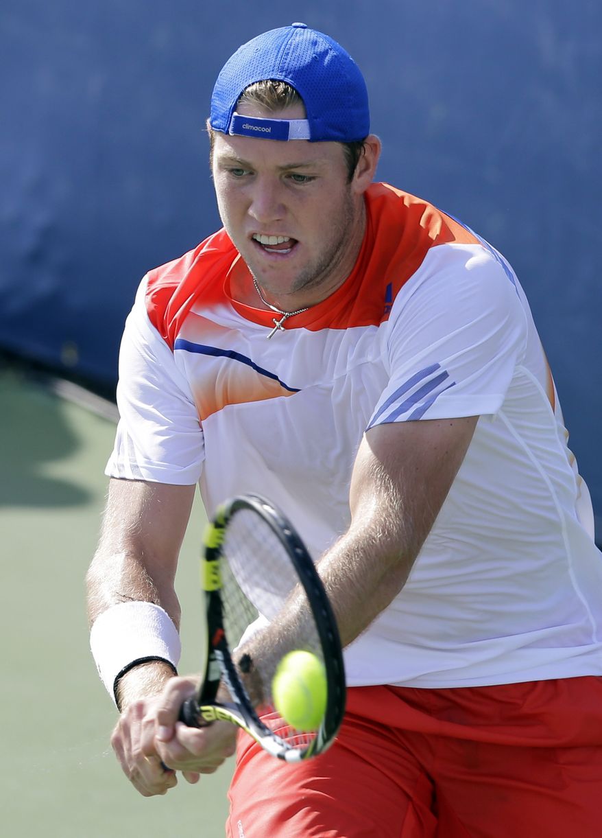 Jack Sock hits the ball during his match against Igor Sijsling, from the Netherlands, at the Citi Open tennis tournament, Tuesday, July 30, 2013 in Washington. Sock won 6-4, 6-2. (AP Photo/Alex Brandon)