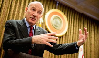 D.C. Council Chairman Phil Mendelson said the bill requiring certain larger retailers to pay a higher minimum wage still has not yet reached his desk. It will then go to Mayor Vincent C. Gray to sign off on it or veto it. (Andrew Harnik/The Washington Times)