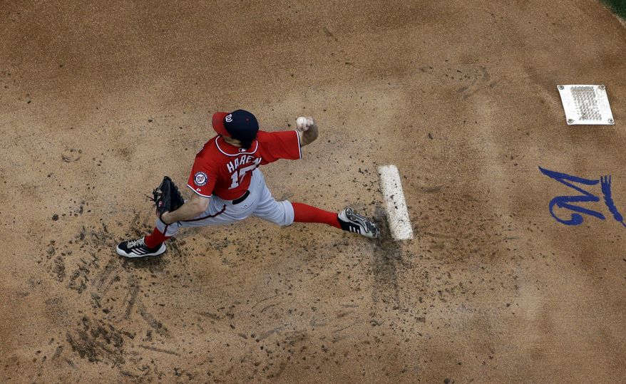 Washington Nationals right-hander Dan Haren throws a pitch in the Nationals' win over the Brewers on Saturday night. Haren was tremendous in seven scoreless innings. (Associated Press photo)