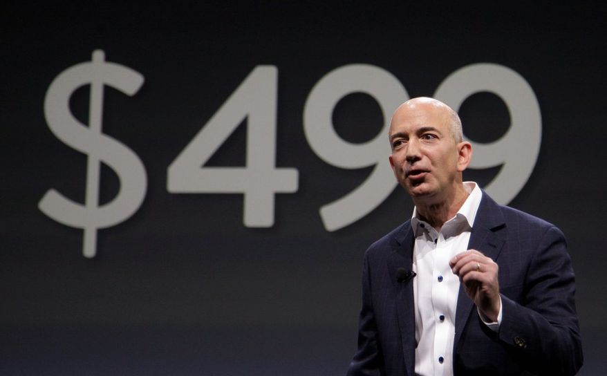 Washington Post buyer Jeff Bezos was described by Slate magazine as an "inscrutable libertarian Democrat." The Amazon CEO has thrust himself into politics in recent years, with views supporting both Democrats and Republicans. (Associated Press)