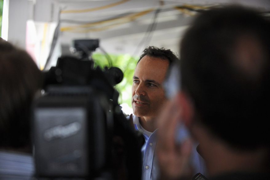 Matt Bevin speaks to the media after the 133rd annual Fancy Farm picnic in Kentucky on Saturday. Mr. Bevin is challenging Minority leader Sen. Mitch McConnell in the Republican primary for U.S. Senate. (Associated Press)
