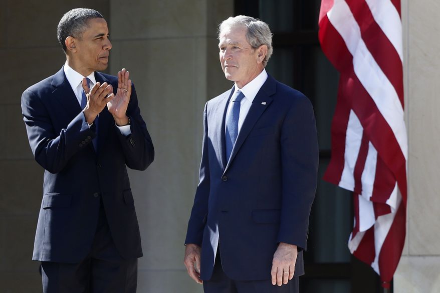 President Obama stands with former President George W. Bush at the dedication of the George W. Bush presidential library on the campus of Southern Methodist University in Dallas on April 25, 2013. (Associated Press) **FILE**