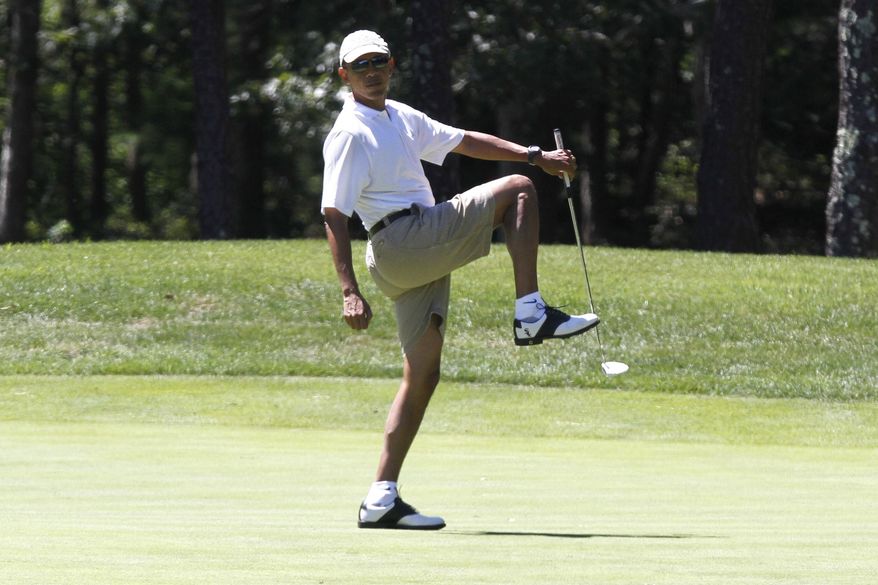 ** FILE ** President Obama reacts as he misses a shot while golfing on the first hole at Farm Neck Golf Club in Oak Bluffs, Mass., on the island of Martha's Vineyard on Sunday, Aug. 11, 2013. (AP Photo/Jacquelyn Martin)