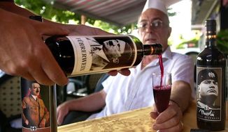 Italian winemaker Alessandro Lunardelli says the vino with labels of Hitler — some with Nazi slogans — Mussolini and others is&quot;not meant to offend anyone.&quot; The L.A.-based Simon Wiesenthal Center, however, is offended, saying the wine &quot;mocks Hitler&#39;s victims.&quot; (associated press)