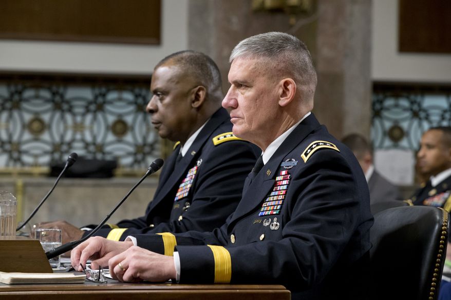 The Senate Armed Services Committee meets on Capitol Hill in Washington on Feb. 14, 2013, to consider the nominations of Gen. Lloyd J. Austin III (left) for reappointment to the grade of general and to be commander of the U.S. Central Command, and Gen. David M. Rodriguez (right) for reappointment to the grade of general and to be commander of the U.S. Africa Command. (Associated Press) **FILE**