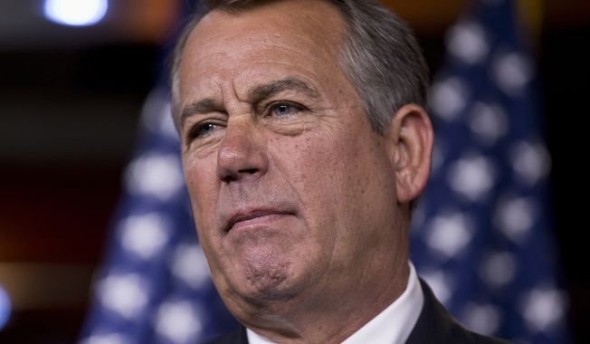 **FILE** House Speaker John Boehner, Ohio Republican, takes questions from reporters at a Capitol Hill news conference on Aug. 1, 2013, as Congress prepares to leave Washington for a five-week recess. (Associated Press)
