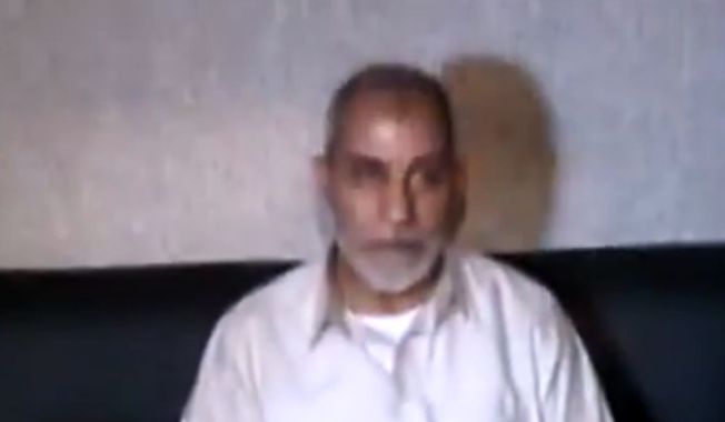 Mohammed Badie, the supreme leader of the Muslim Brotherhood, is seen in a screen capture from Egypt State TV after being detained by Egyptian security officials in Cairo on Tuesday, Aug. 20, 2013. (AP Photo/Egypt State TV)