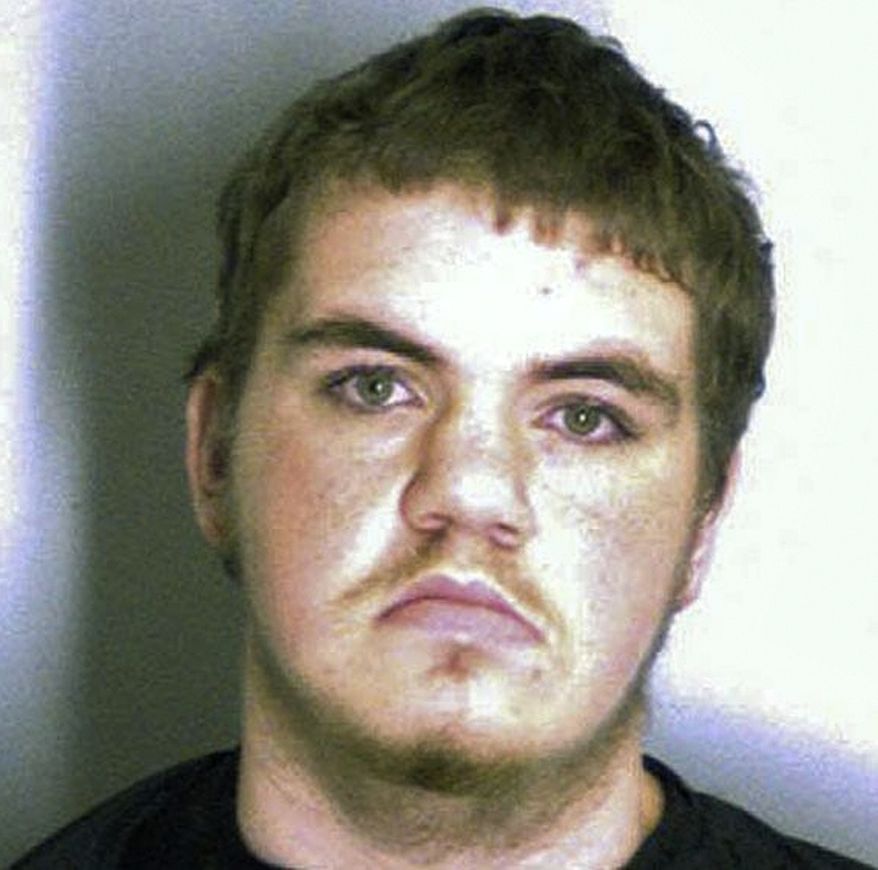 Michael Brandon Hill, 20, faces numerous charges related to a school invasion in Decatur, Ga., on Tuesday, Aug. 20, 2013. (AP Photo/DeKalb County Sheriff's Department)