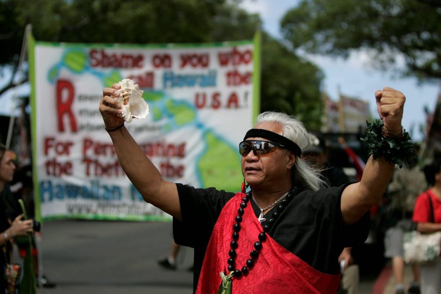 Native Hawaiian activists march during an independence protest in Honolulu as the island commemorates the 50th anniversary of statehood in 2009. The Akaka bill to treat Native Hawaiians the same as other indigenous groups in the U.S. was first introduced in 2000. Approved by the House three times, the measure never passed the Senate. (Associated Press photographs)