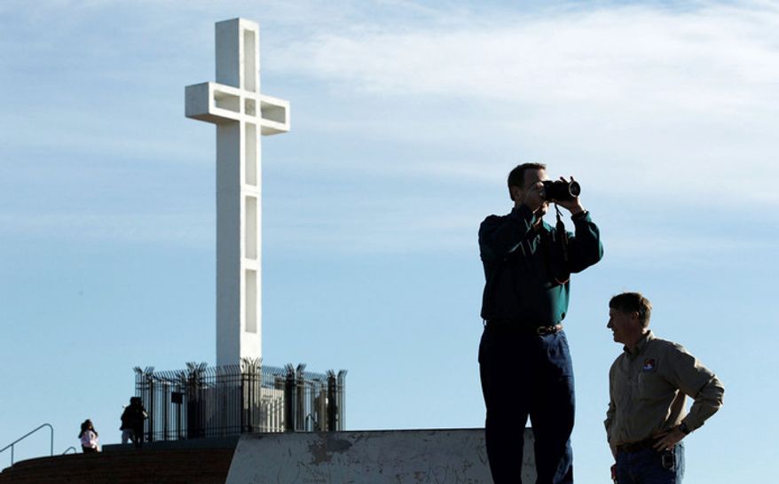 Republican lawmakers have joined the fight to stop a federal court from ordering the removal of the giant white cross that has loomed for decades over the Mount Soledad Veterans War Memorial in San Diego. (Associated Press)