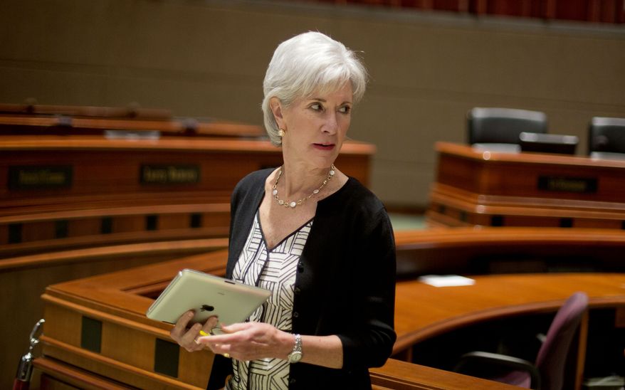 ** FILE ** Kathleen Sebelius, secretary of health and human services, leaves the podium after discussing the Affordable Care Act at a news conference in Atlanta on Tuesday, Aug. 13, 2013. (AP Photo/David Goldman)